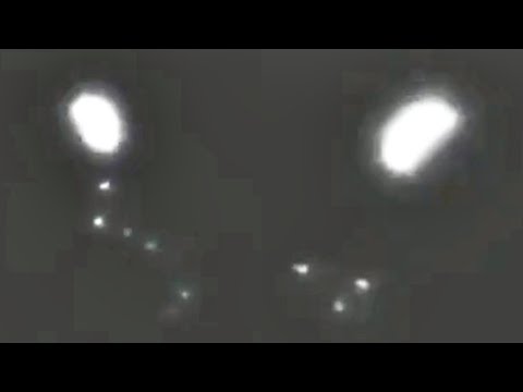 Egg Shaped UFO Caught On Camera Dropping Orbs